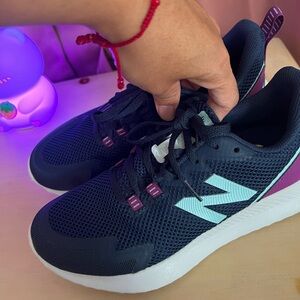 New Balance Women's Black and White Sneakers